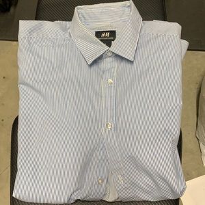 Size Medium. Long sleeve, baby blue stripped shirt.